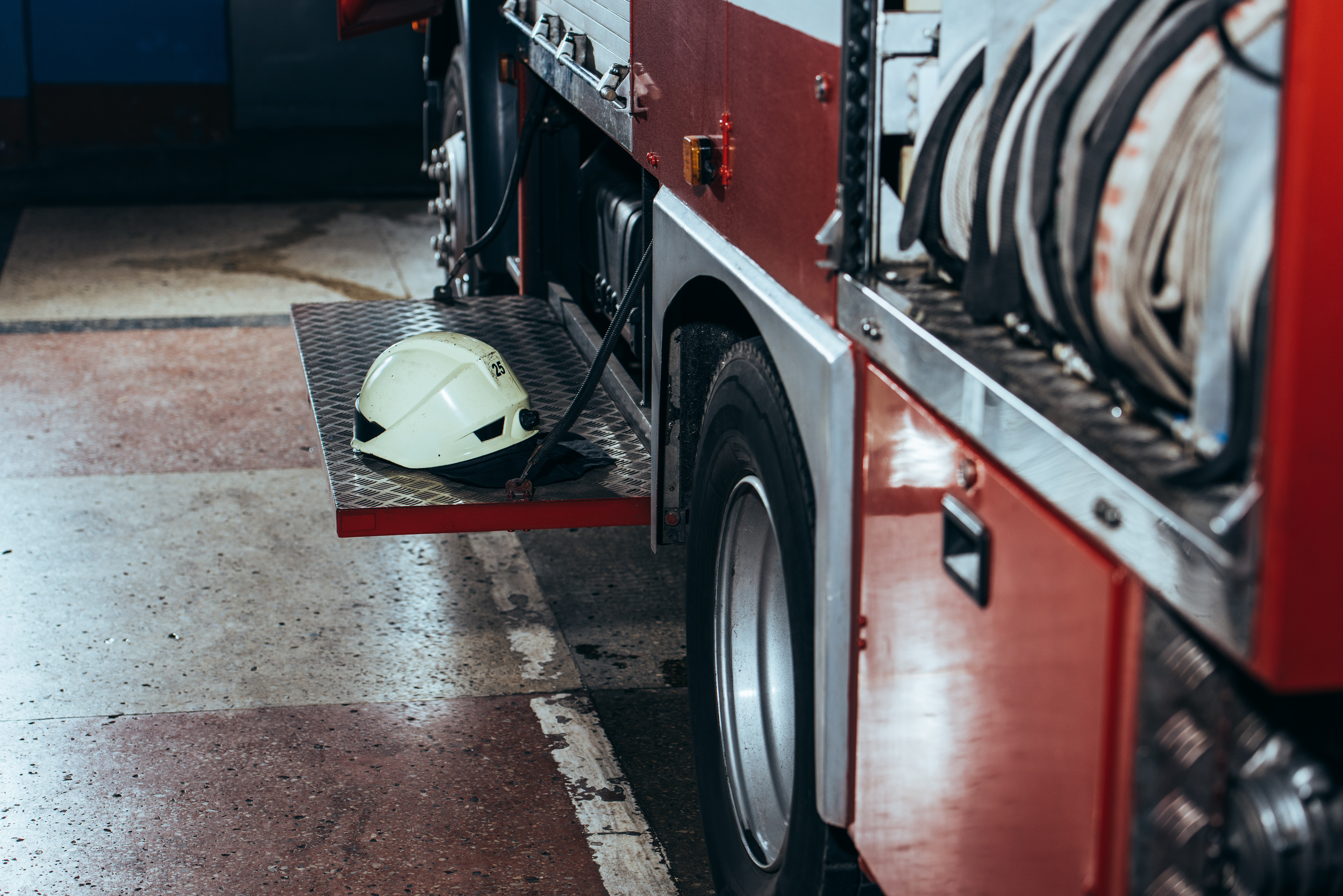close-up-view-of-protective-helmet-on-fire-truck-a-2024-11-18-13-36-42-utc